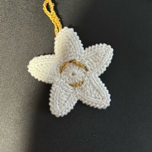 2 custom handmade crochet Christmas star ornaments
